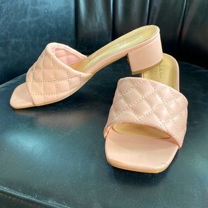 Pink heeled slides
